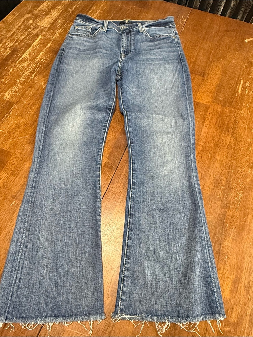 7 For All Mankind Women's Size 28 Flare Jeans Medium Wash Raw Hem Cropped Denim